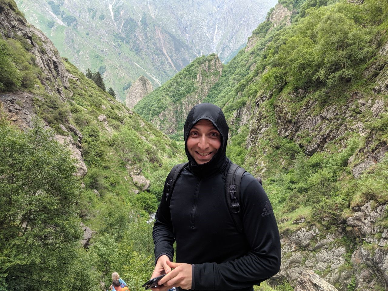 Picture of Vitaly Freidman. Green mountains in the background